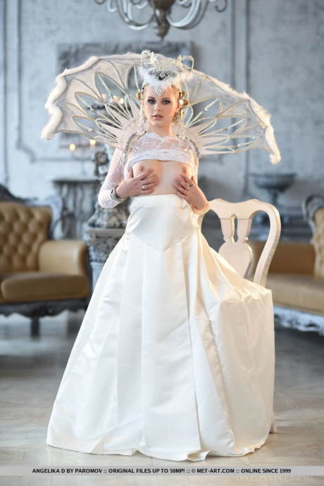 Euro babe Angelika D baring phat young ass beneath glamorous wedding dress