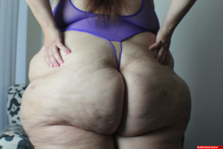 Amateur whore gf woman displays her giant butt and thunder thighs in revealing undies