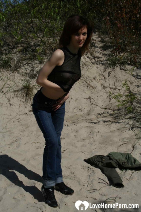 Saucy amateur babe strips & shows her tits while hiking in nature