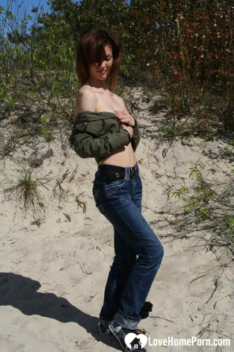 Saucy amateur babe strips & shows her tits while hiking in nature