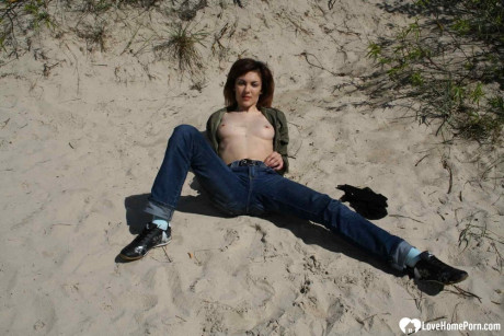 Saucy amateur babe strips & shows her tits while hiking in nature