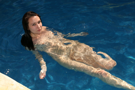 Wet teenage babe Lila shows her pretty holes after going for a swim