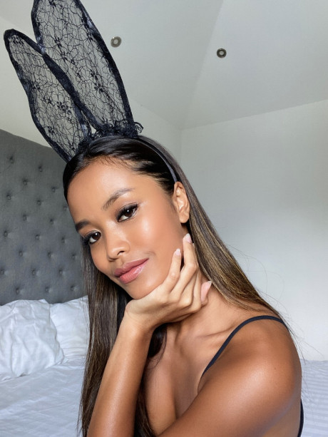 Adorable thin babe Putri Cinta flaunts her fake melons wearing bunny ears