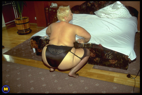 Chubby old amateur Eline showing off her fat undressed body & her saggy melons
