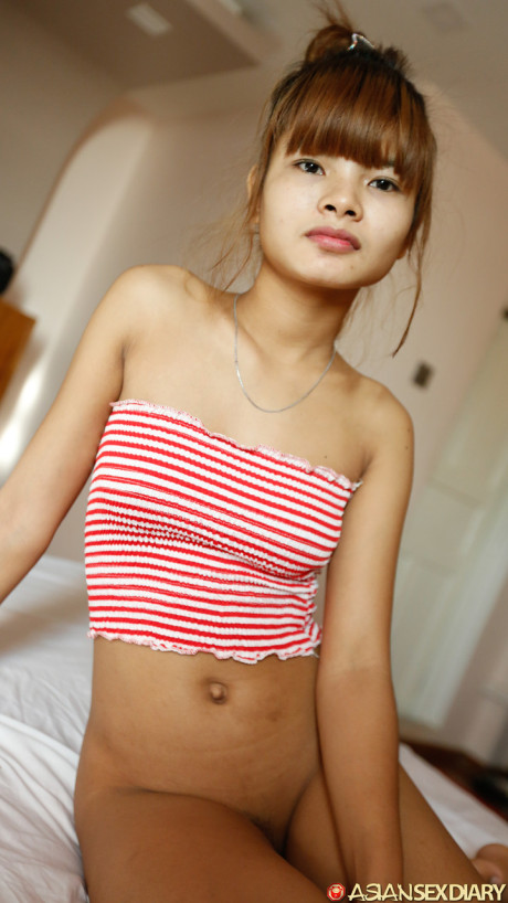 Beautiful fine asian teen Mildred B	flaunts her tiny breasts as she gets nailed in POV