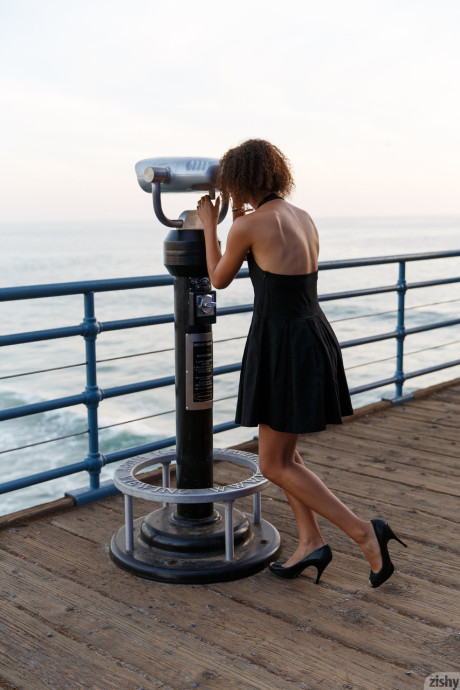 Skinny black Desiree Jacobsen shows her tiny boobs & bubble ass in a solo