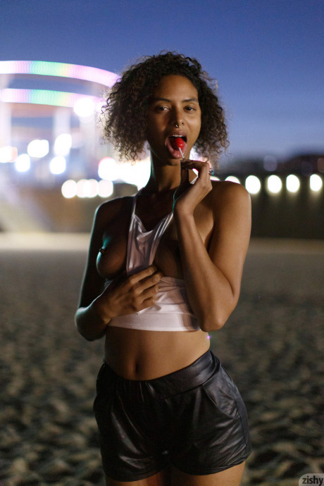 Skinny black Desiree Jacobsen shows her tiny boobs & bubble ass in a solo