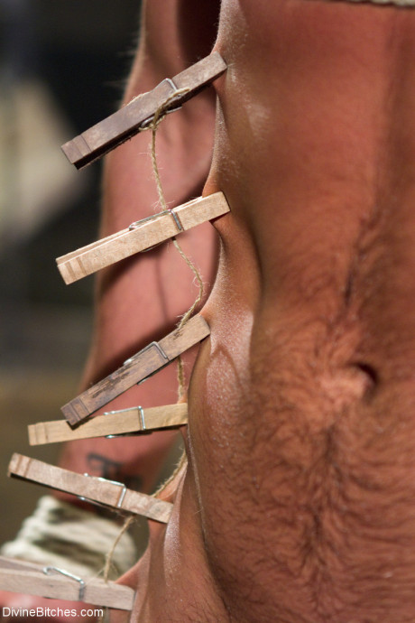 Fine domme in a latex outfit Beretta James torments a masked slave's dick