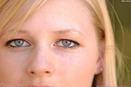 Blondy Mary Anne inserting her pretty white panties into her hot snatch outside