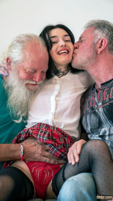 Kinky maid Snow DeVille gets spit roasted in a sleazy debauchery with cougar males