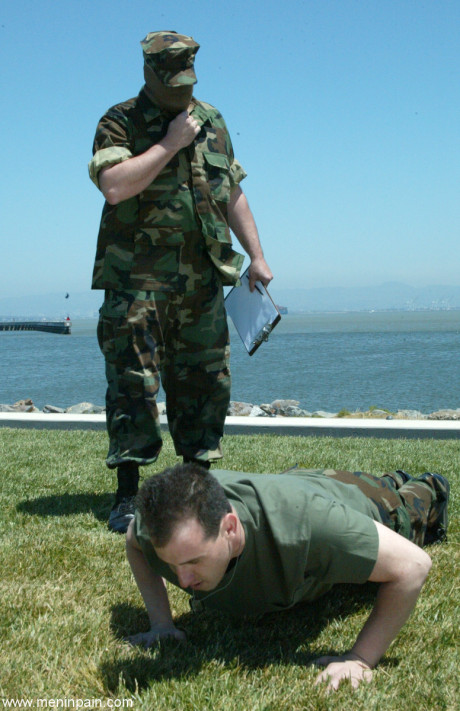 Oriental general Mika Tan disciplines a soldier and grabs his rod