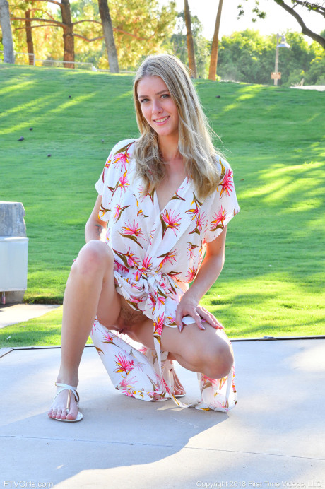 Adorable babe Mazzy hikes her fluttering dress and shows her twat and butt