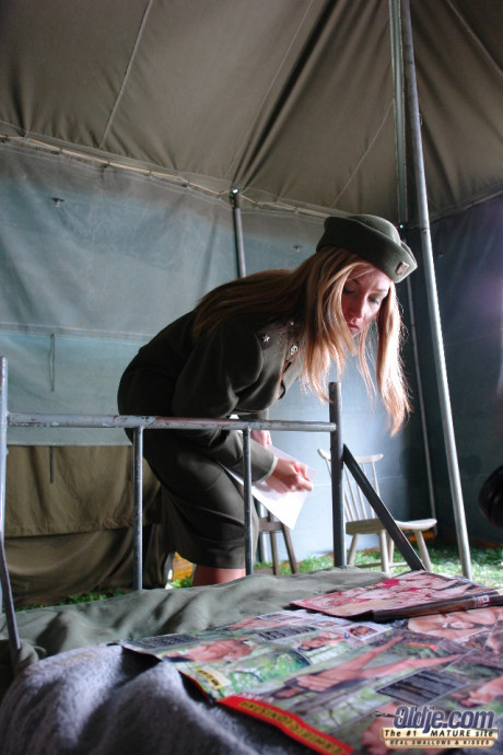 Blondy military woman Angela Crown gets her vagina filled by a prisoner