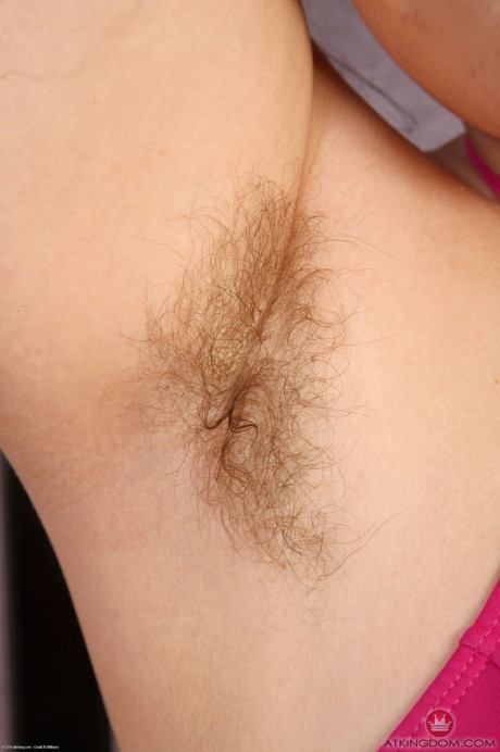 Curvy teenie with a stunning sexy face Suzie shows her silky armpits & vagina in the gym
