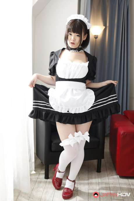 Adorable Japanese maid Ai Mashiro unveils her breasts and undergarment too