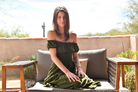 Brunette first timer Lily slips a vibrator in her shaved cunt